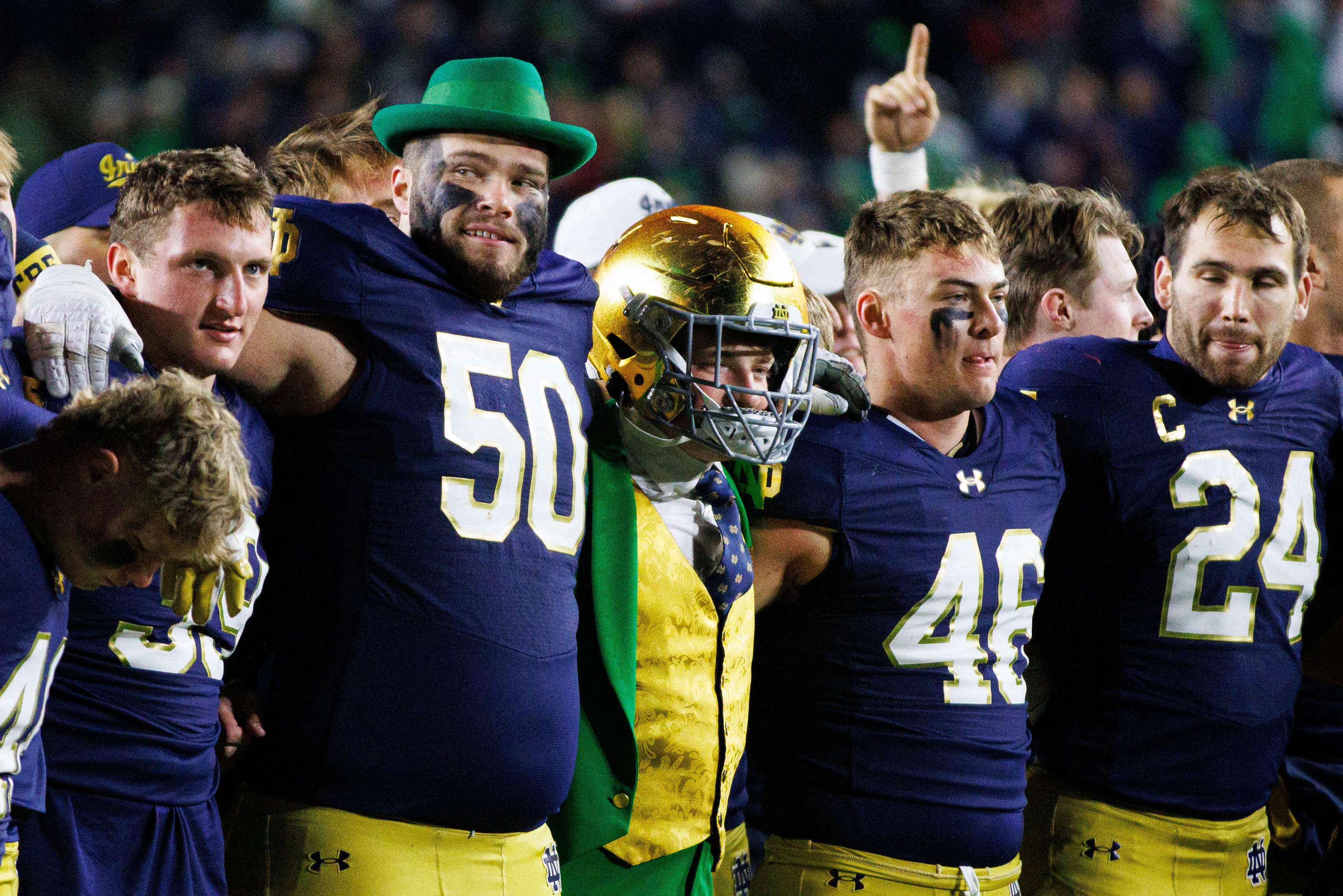 The Notre Dame Leprechaun wears offensive lineman Rocco Spindler's (50) helmet after winning a NCAA college football game 52-3 against Florida State