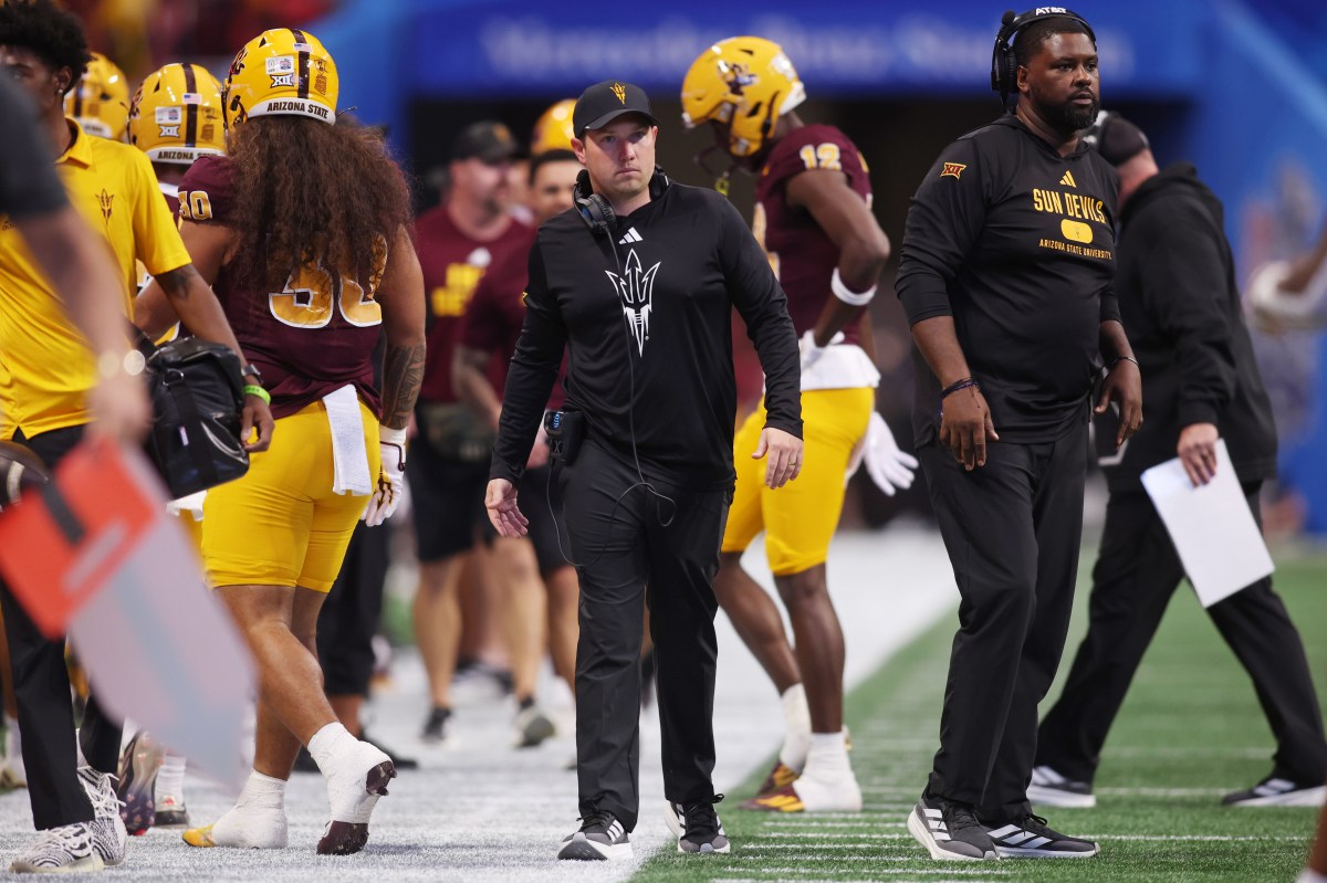 Arizona State Sun Devils head coach Kenny Dillingham looks on during the first half of the Peach Bowl at Mercedes-Benz Stadium.
