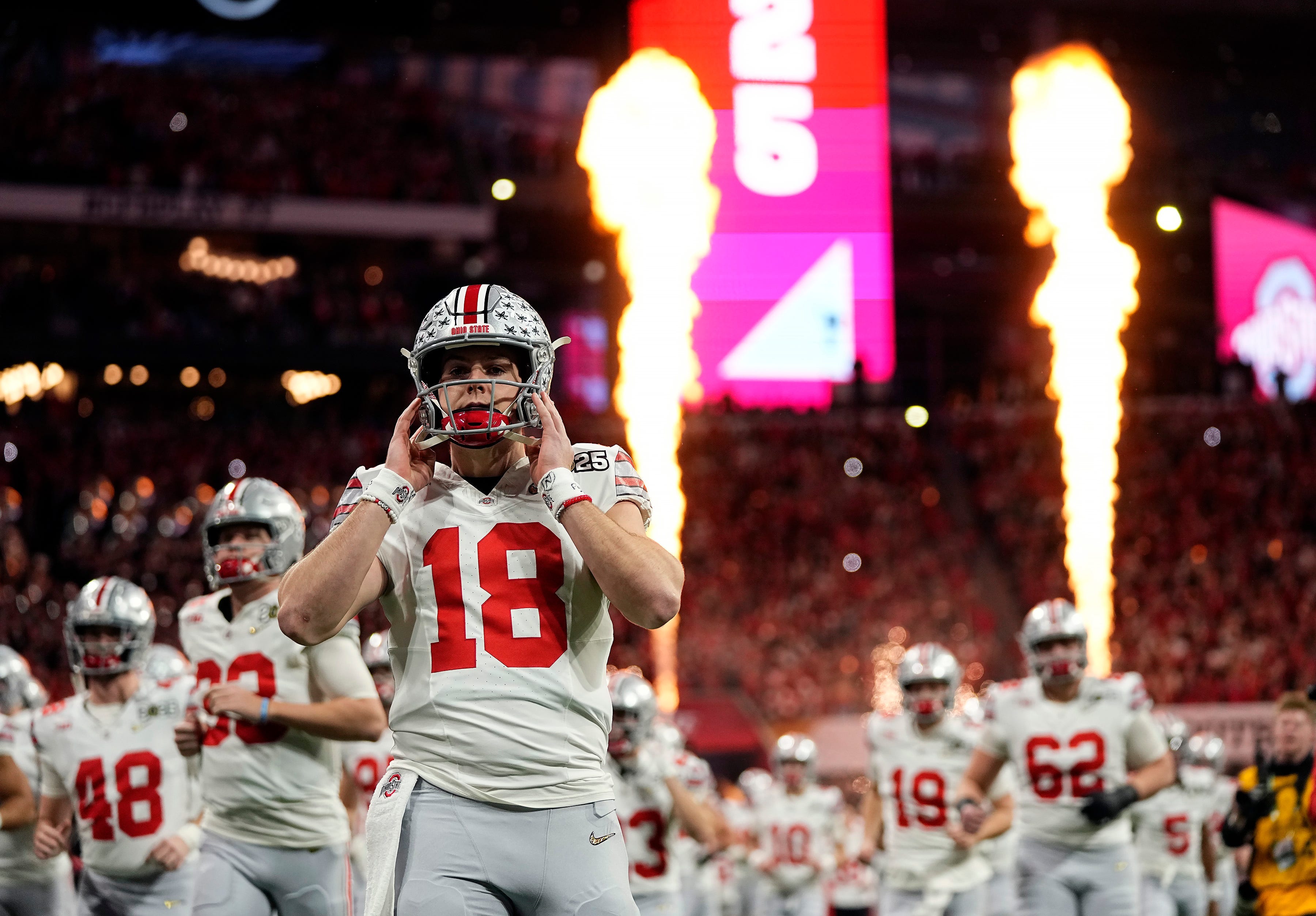 Ohio State Buckeyes quarterback Will Howard (18) take the field for the start of the game against Notre Dame Fighting Irish during the College Football Playoff National Championship