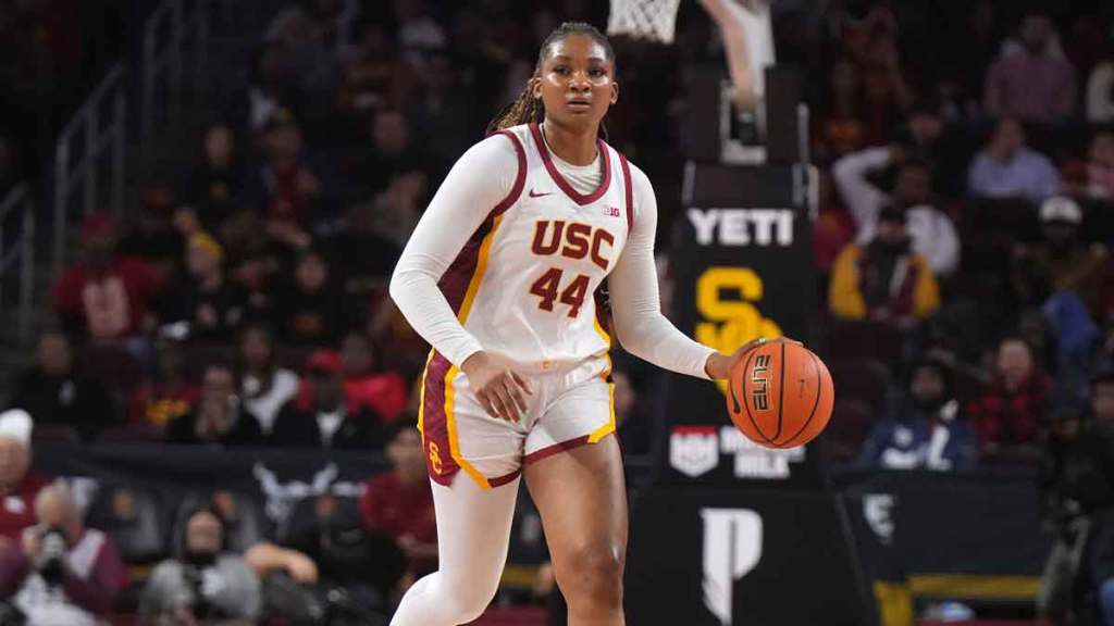 Southern California Trojans forward Kiki Iriafen (44) dribbles the ball against the Michigan Wolverines in the first half.
