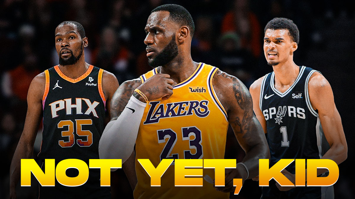 Lakers' LeBron James, Suns' Kevin Durant smiling at Spurs' Victor Wembanyama, caption below: NOT YET, KID
