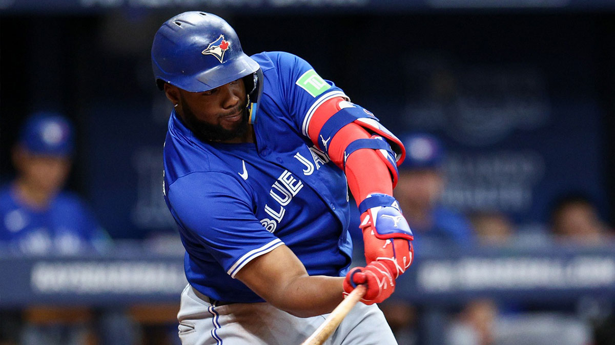 Toronto Blue Jays third baseman Vladimir Guerrero Jr. (27) hits a single against the Tampa Bay Rays in the fifth inning at Tropicana Field.