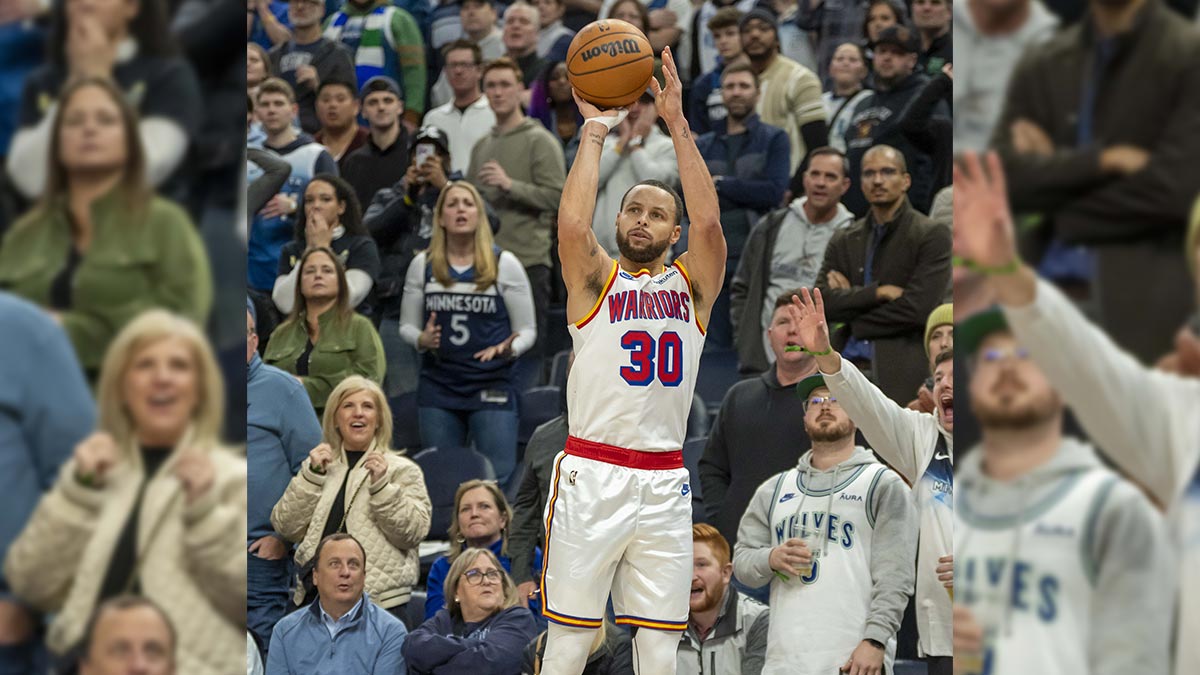 Warriors guard Stephen Curry (30) shoots for three