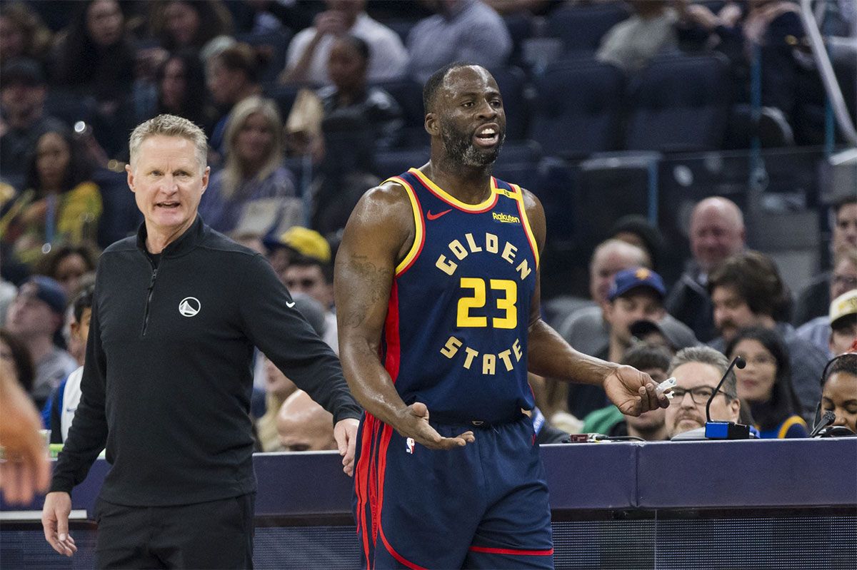 Warriors forward Draymond Green (23) and head coach Steve Kerr react during the first quarter against the Miami Heat at Chase Center