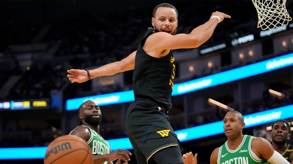 Golden State Warriors guard Stephen Curry (30) has the ball knocked out of his hands against the Boston Celtics in the third quarter at Chase Center. 