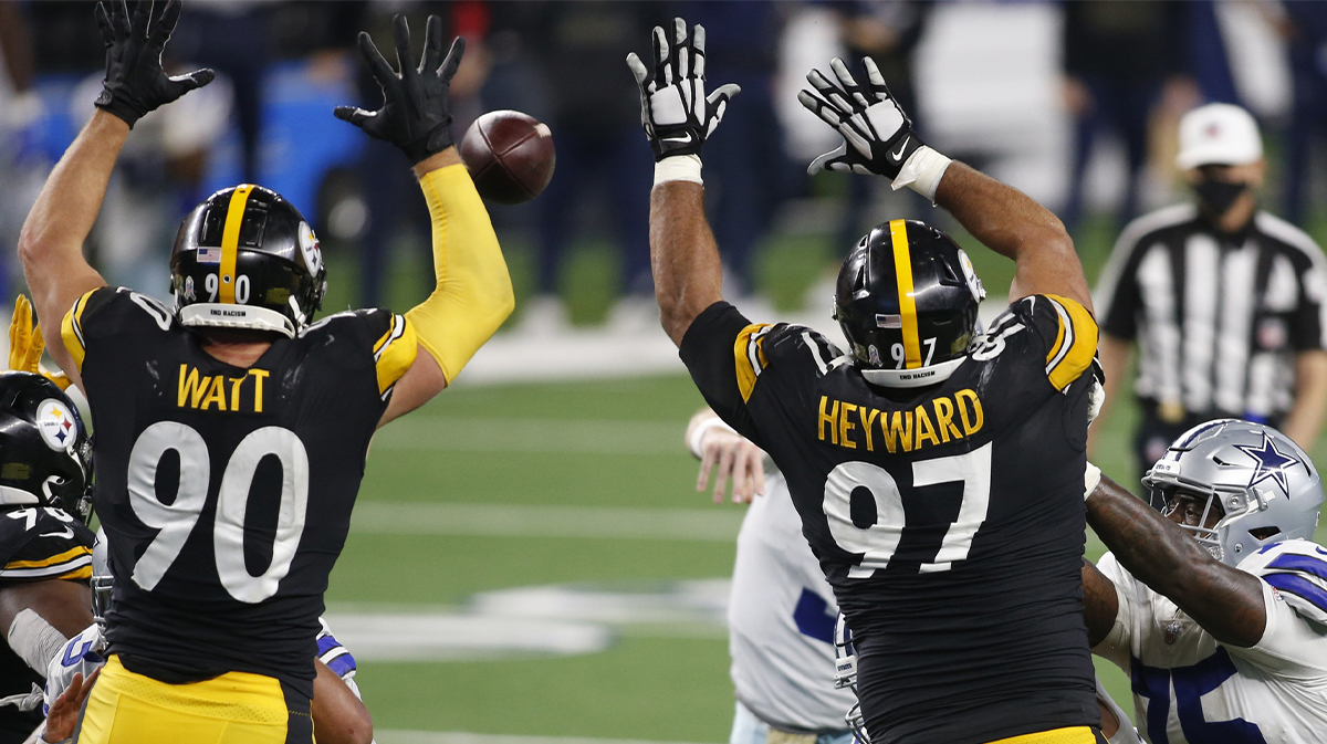 Nov 8, 2020; Arlington, Texas, USA; Pittsburgh Steelers outside linebacker T.J. Watt (90) and defensive end Cameron Heyward (97) defend against a pass by Dallas Cowboys quarterback Garrett Gilbert (3) in the fourth quarter at AT&T Stadium.