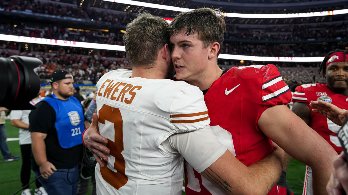 Ohio State quarterback Will Howard (18) meets Texas Longhorns quarterback Quinn Ewers (3) after the College Football Playoff semifinal game in the Cotton Bowl at AT&T Stadium on Friday, Jan. 10, 2024 in Arlington, Texas. Ohio State beat Texas 28-14 to advance to the National Championship.