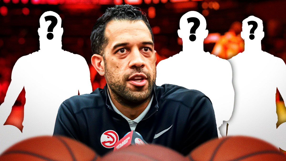 Landry Fields in the middle, three mystery players beside him, Atlanta Hawks wallpaper in the backgrounds