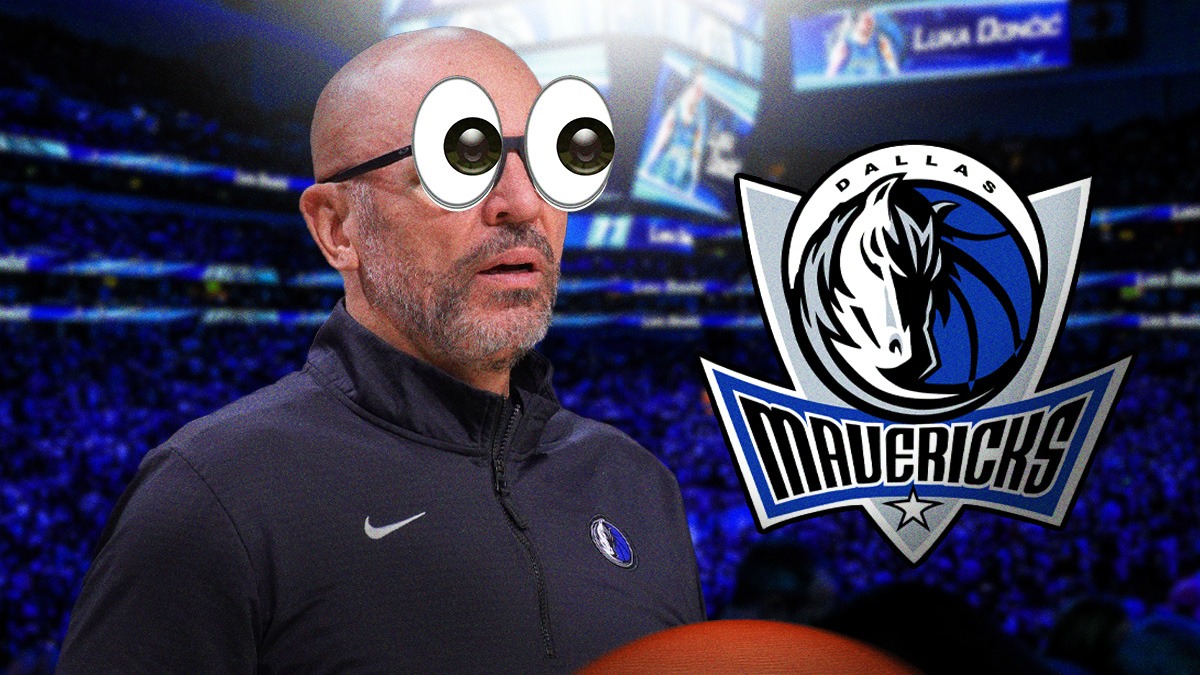 Jason Kidd with emoji eyes looking at a Mavericks logo