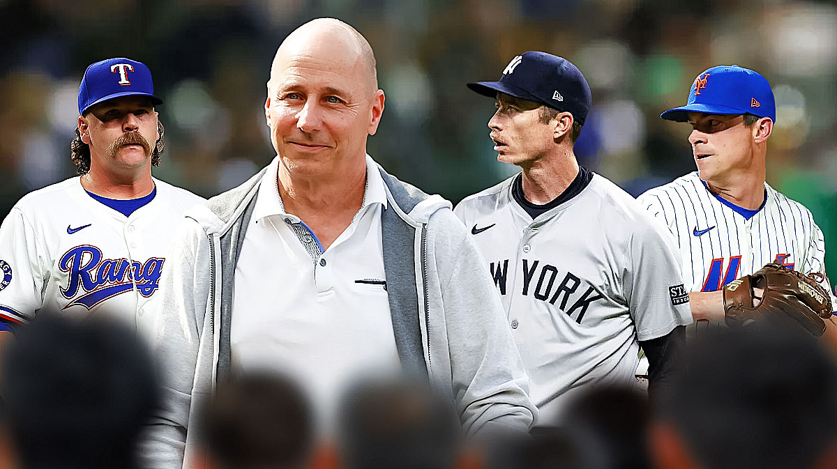 Yankees GM Brian Cashman (center) looking at Tim Hill, Brooks Raley, and Andrew Chafin