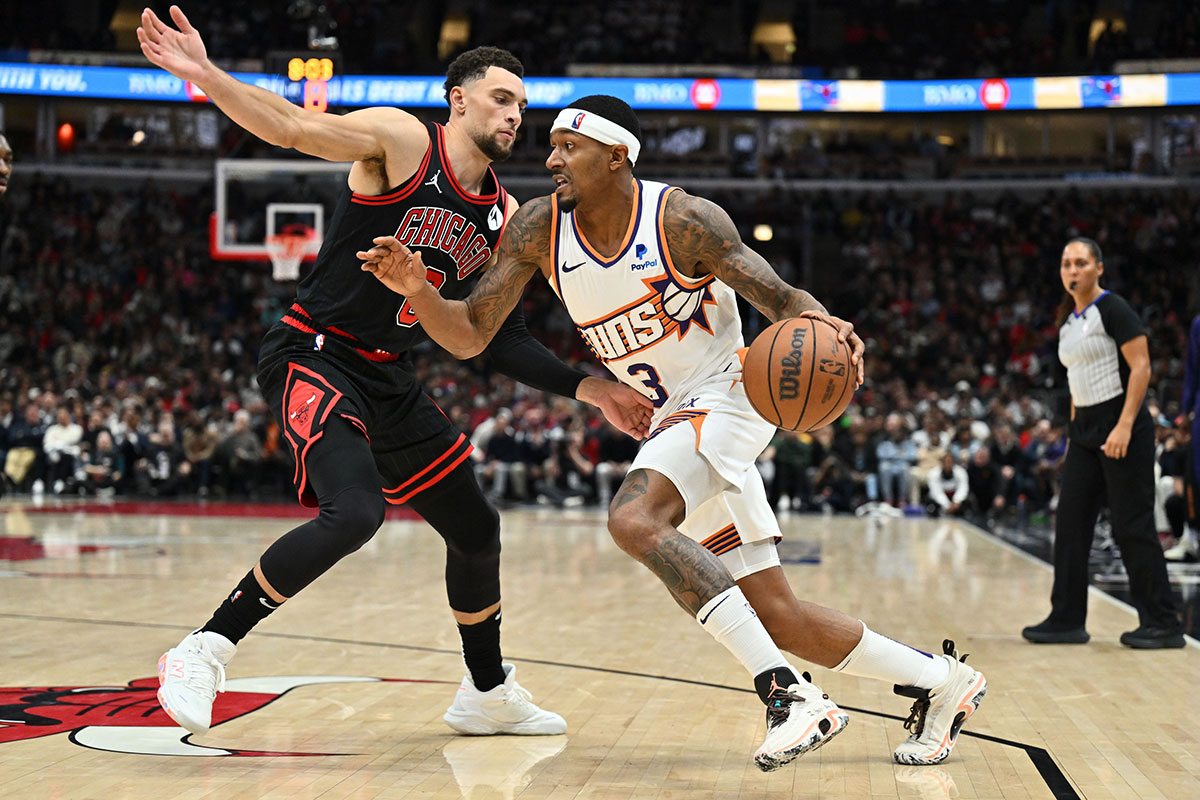 Phoenix Suns guard Bradley Beal (3) drives to the basket as Chicago Bulls forward Zach LaVine (8) defends in the second half at United Center.