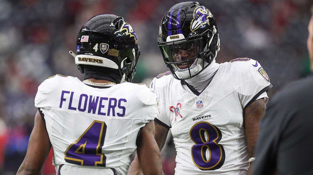 Baltimore Ravens quarterback Lamar Jackson (8) shakes hands with wide receiver Zay Flowers (4) before the game against the Houston Texans at NRG Stadium.