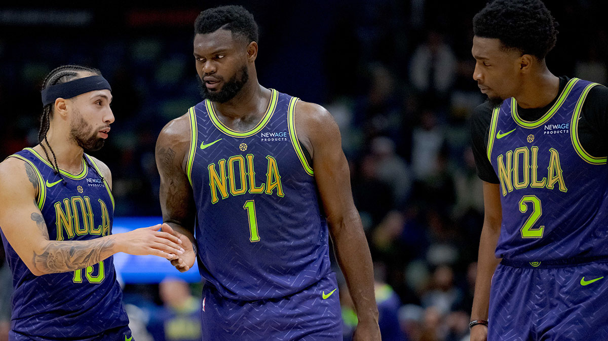 New Orleans Pelicans guard Jose Alvarado (15), forward Zion Williamson (1), and forward Herbert Jones (2) react during the second half against the Minnesota Timberwolves at Smoothie King Center.