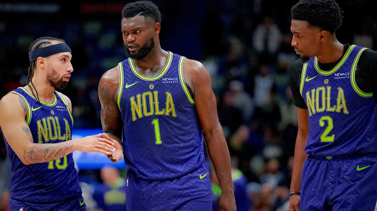 New Orleans Pelicans guard Jose Alvarado (15), forward Zion Williamson (1), and forward Herbert Jones (2) react during the second half against the Minnesota Timberwolves at Smoothie King Center.