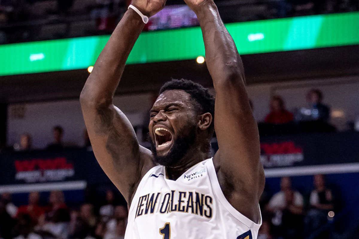 New Orleans Pelicans Next to Zion Williamson (1) Durns the ball on Friday in Indian during the first half in the center of Smoothie King.