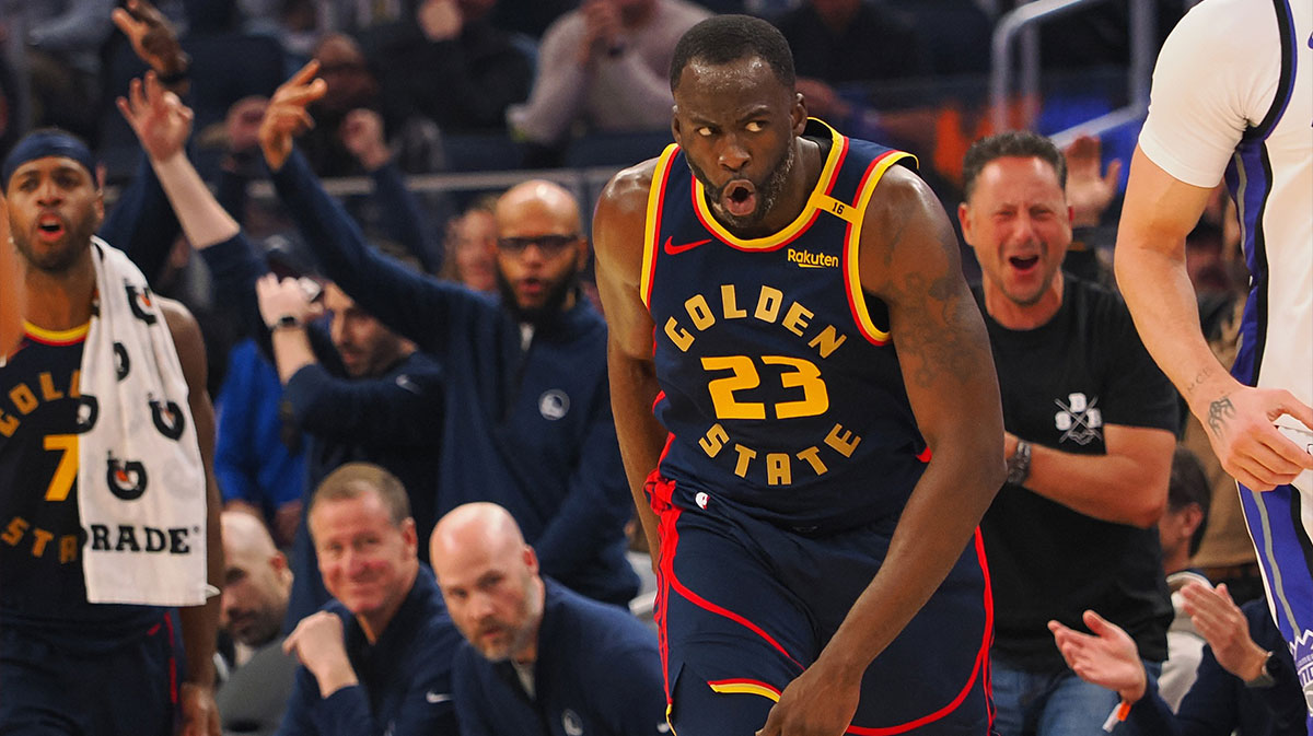 Golden State Warriors forward Draymond Green (23) reacts after a basket against the Sacramento Kings during the second quarter at Chase Center.