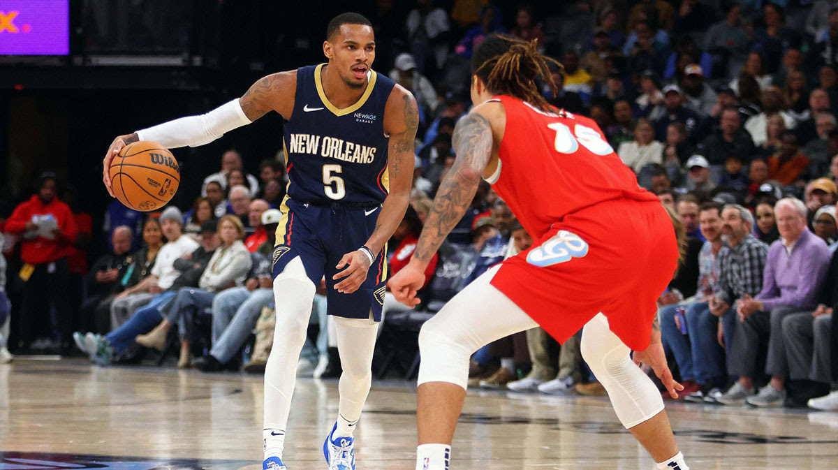 New Orleans Pelicans Guard Dejounte Murrai (5) Dribbles AS Memphis Grizzlies Next Brandon Clarke (15) is prohibited during the third quarter in FedExforum. 