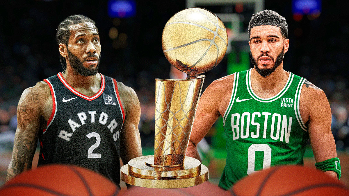 Kawhi Leonard and Jayson Tatum with an NBA championship trophy.