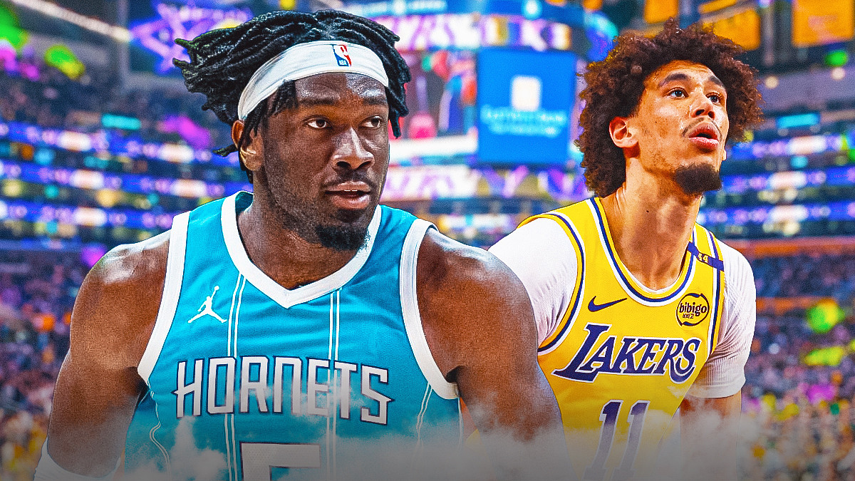 Mark Williams in a Hornets jersey next to Jaxson Hayes in a Lakers uniform on the Lakers court.
