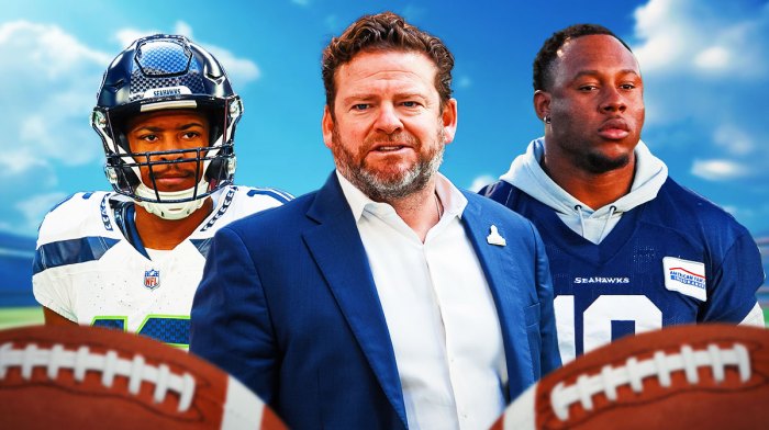 Seahawks John Schneider (front, center) with cut candidates Seahawks Tyler Lockett (left) and Seahawks Uchenna Nwosu (right) in 2025 NFL offseason