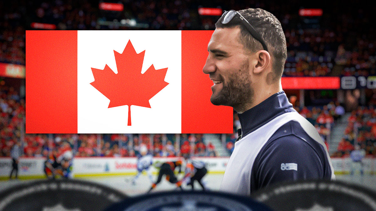 Paul Bissonnette next to Canadian flag