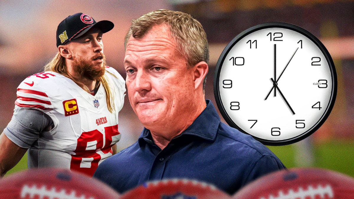 49ers general manager John Lynch with a clock next to him, as well as 49ers tight end George Kittle