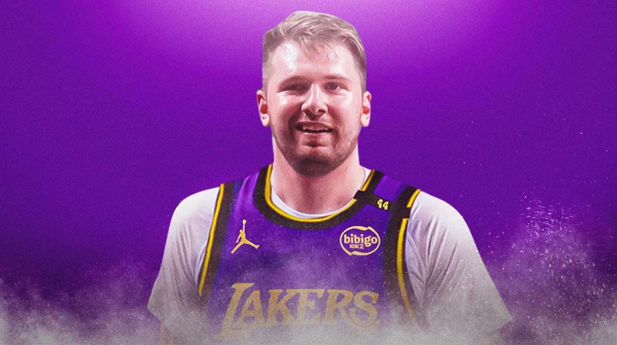 Luka Doncic smiles in Lakers jersey
