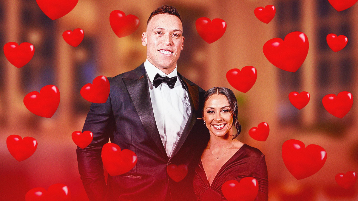 Aaron Judge and his wife, Samantha Bracksieck, in the center with hearts all around.