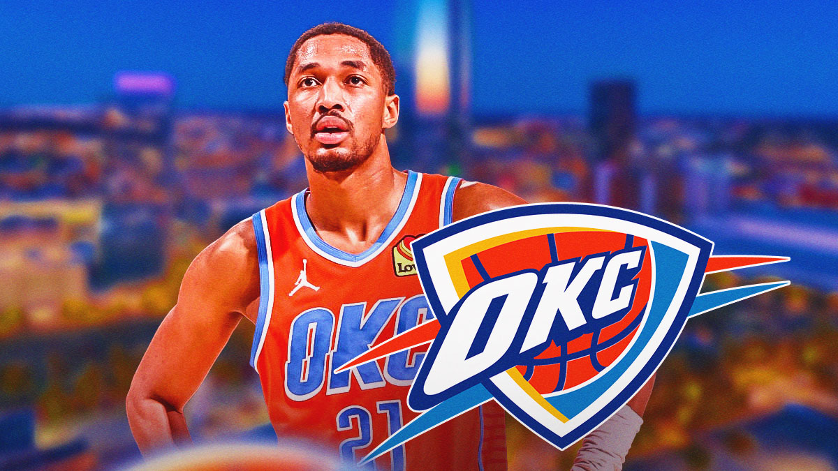 Thunder guard Aaron Wiggins next to the Thunder logo with the Oklahoma City skyline in the background