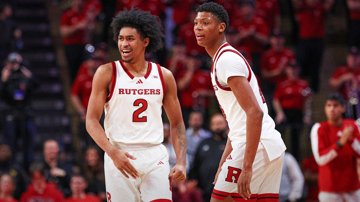 Rutgers Scarlet Knights guard Dylan Harper (2) celebrates in front of guard Ace Bailey (4) during the second half against the UCLA Bruins at Jersey Mike's Arena.