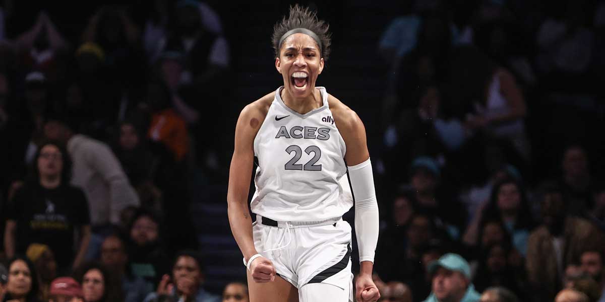 Las Vegas Aces center A'ja Wilson (22) celebrates after scoring in the fourth quarter against the New York Liberty during game two of the 2024 WNBA Semi-finals at Barclays Center.