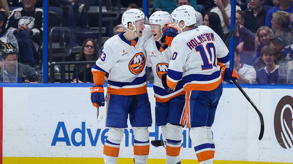 New York Islanders defenseman Adam Boqvist (34) celebrates after scoring a goal against the Tampa Bay Lightning in the second period at Amalie Arena.