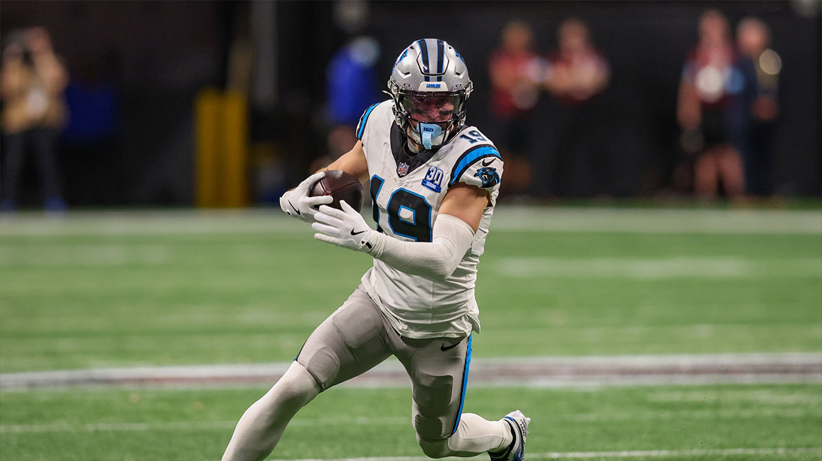 Carolina Panthers wide receiver Adam Thielen (19) runs after a catch against the Atlanta Falcons in overtime at Mercedes-Benz Stadium.