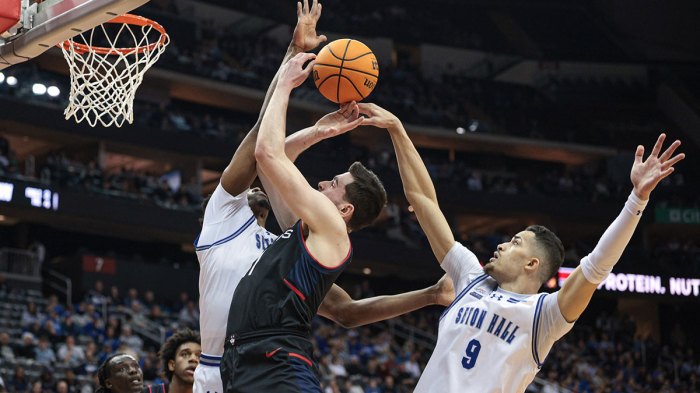 Connecticut Huskies forward Alex Karaban (11) goes to the basket asSeton Hall Pirates forward Yacine Toumi (9) defends during the first half at Prudential Center.