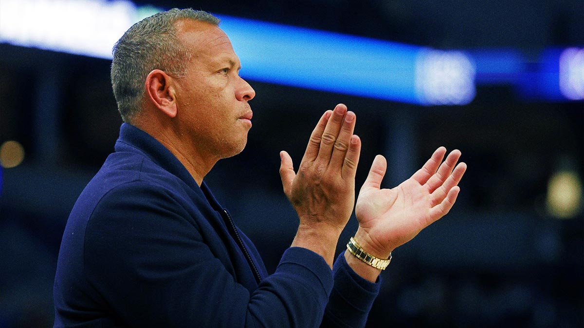 Alex Rodriguez applauds as the Minnesota Timberwolves play the Portland Trail Blazers in the first quarter at Target Center.