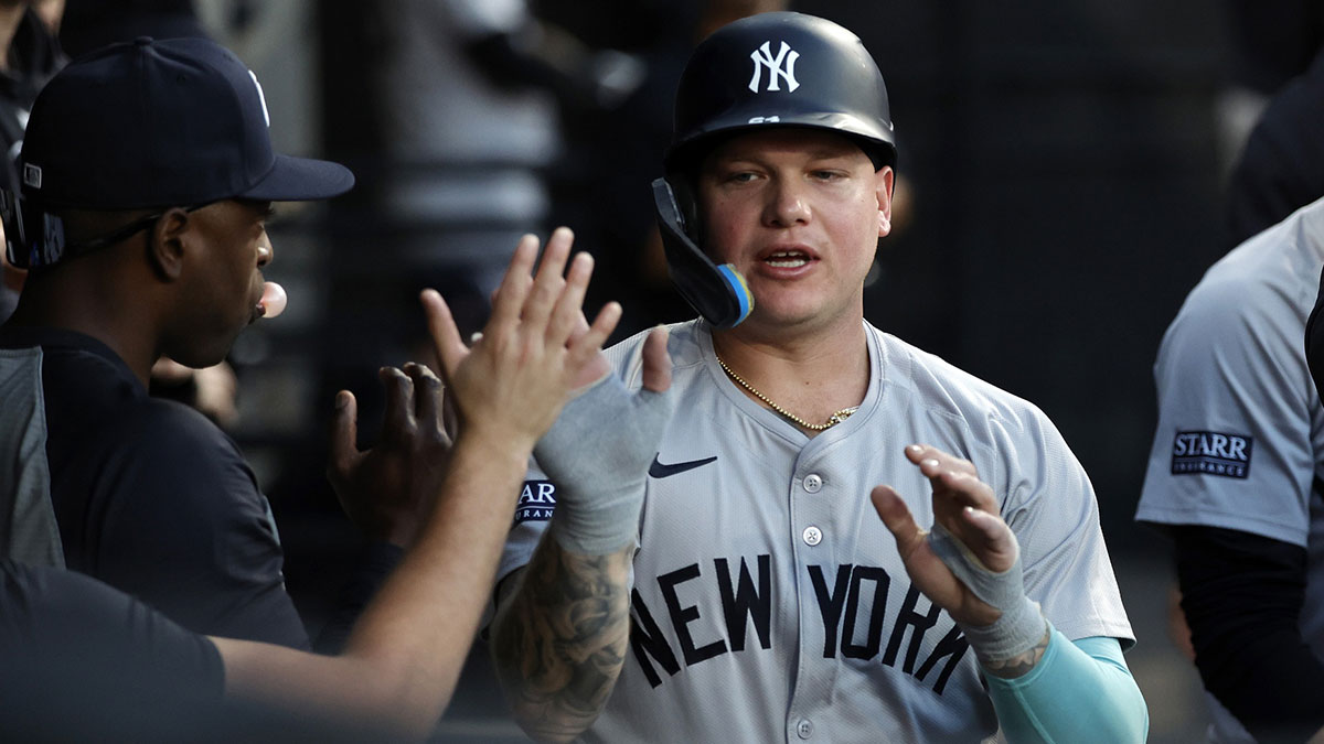 New York Yankees outfielder Alex Verdugo (24) reacts in the dug out after scoring against the Chicago White Sox during the first inning at Guaranteed Rate Field.