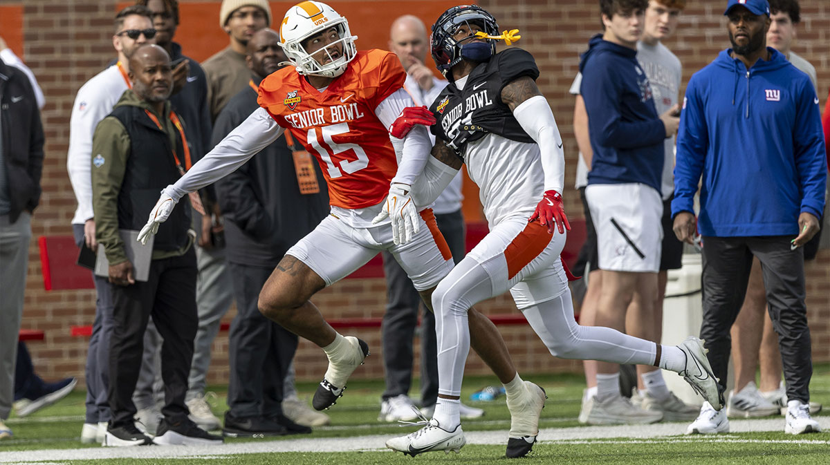 merican team wide receiver Bru McCoy III of Tennessee (15) battles with American team defensive back Trey Amos of Ole Miss (21) during Senior Bowl practice for the American team at Hancock Whitney Stadium