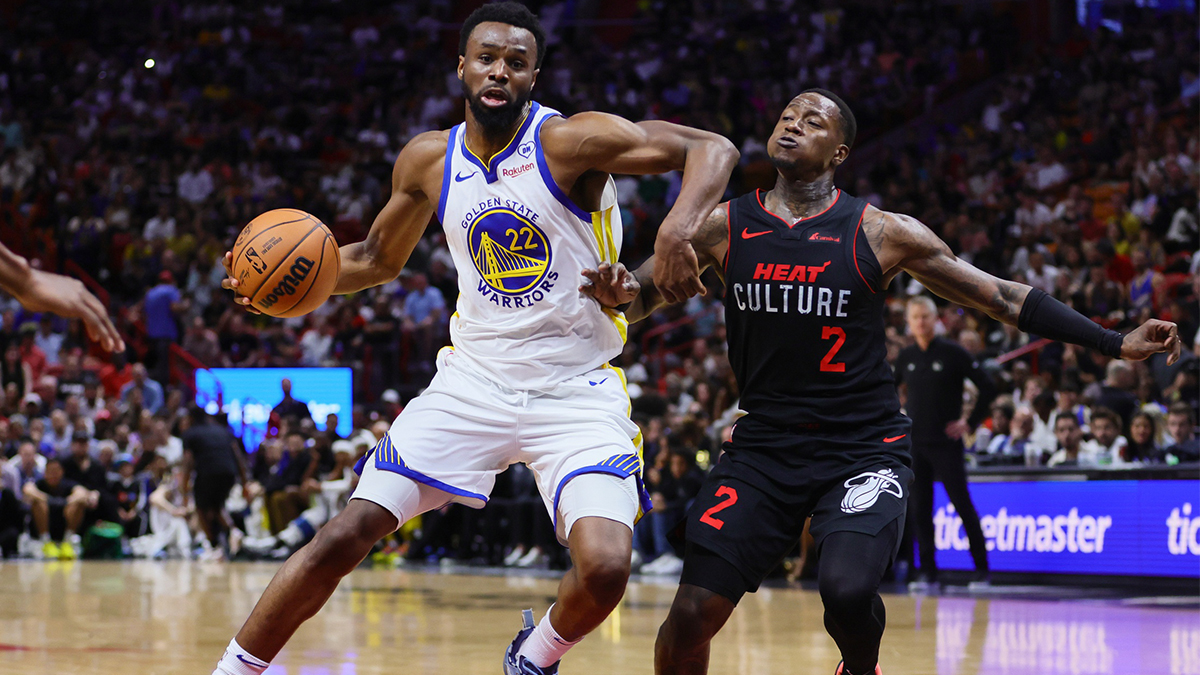 Golden State Warriors Next Andrew Viggins (22) Drive in basket against Miami heat Terri Rozier (2) during the second quarter in the Cashier Center.