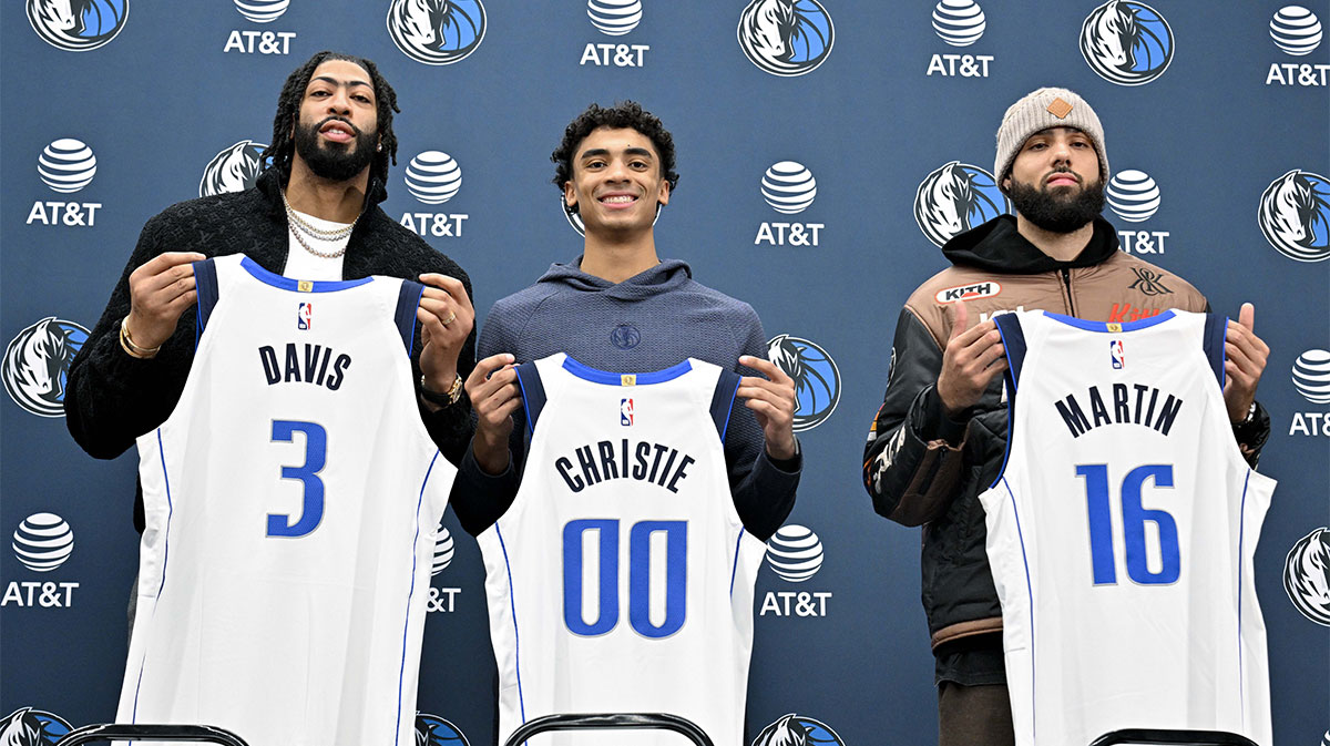 Dallas Mavericks Next Anthony Davis (3) and store Max Christie (00) and Caleb Martin (16) is posed for a photo with its new MAV jerseys during the press conference at Dallas Mavericks. 