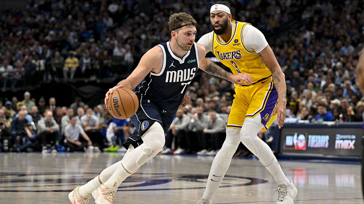 Dallas Mavericks guard Luka Doncic (77) drives to the basket past Los Angeles Lakers forward Anthony Davis (3) during the second half at the American Airlines Center. 