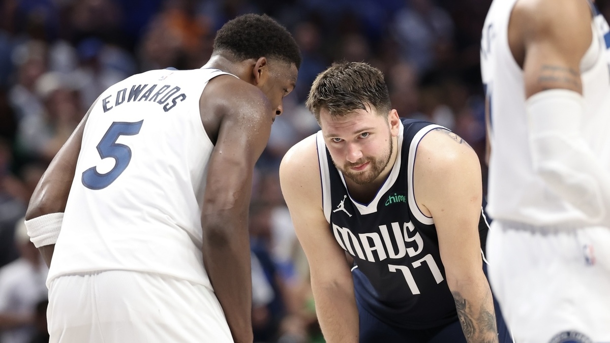 Minnesota Timbervolves Guard Anthoni Edwards (5) speaks to Dallas Mavericks Guard Luka Doncic (77) during the fourth quarter of the Games for the Western Conference for Playoffs in American Airlines.