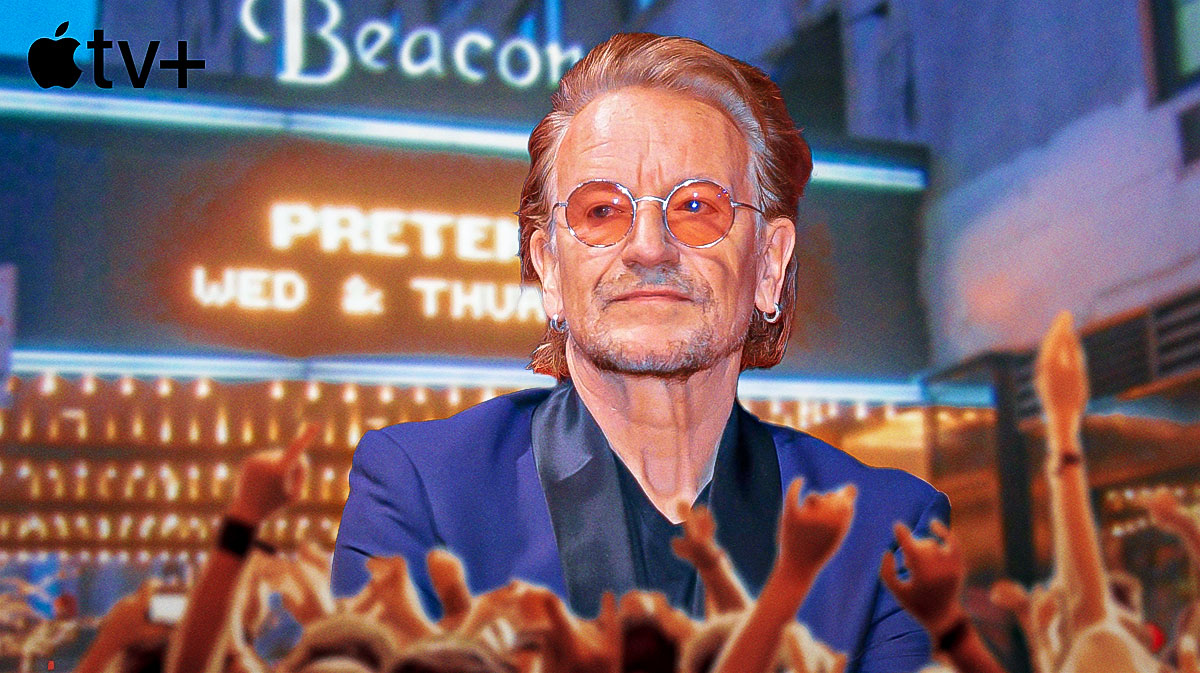 U2 singer Bono in front of the Beacon Theater, where he performed the Stories of Surrender Tour, with Apple TV+ logo.