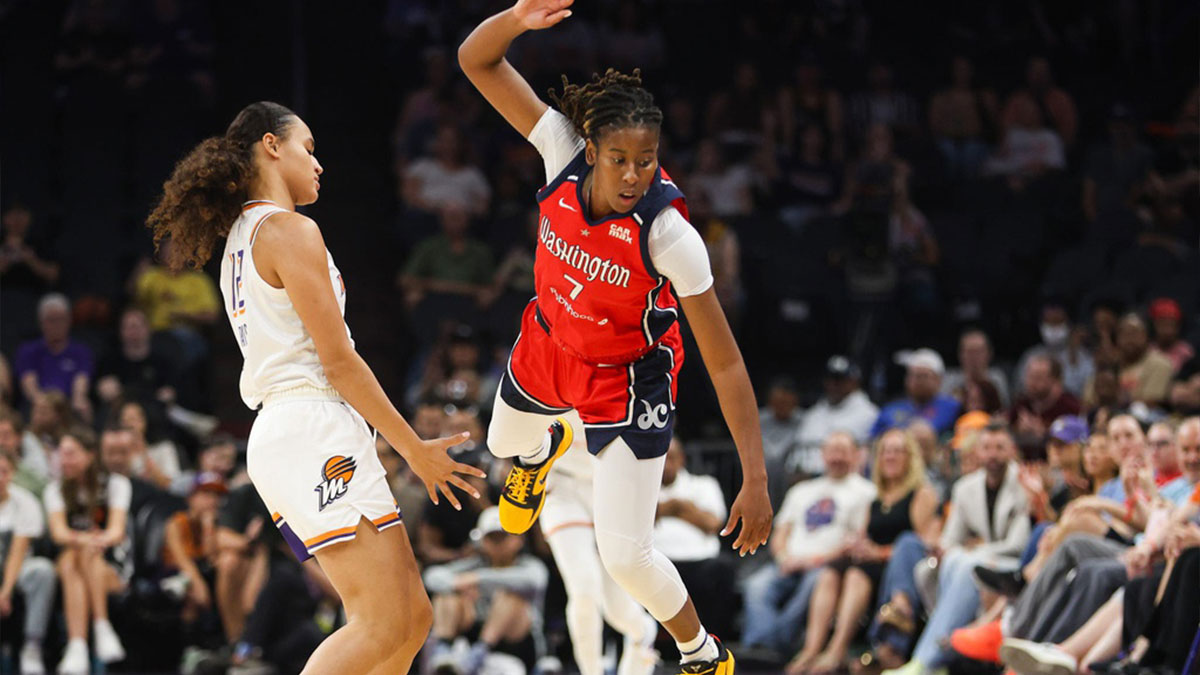 Washington Mystics guard Ariel Atkins (7) flies through the air going for a loose ball on Sept. 5, 2024 at Footprint Center in Phoenix.