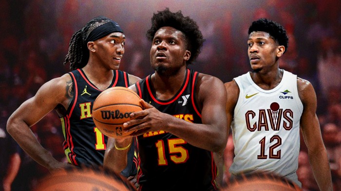 Hawks' Terance Mann, Clint Capela, and Cavs' De'Andre Hunter side by side looking serious