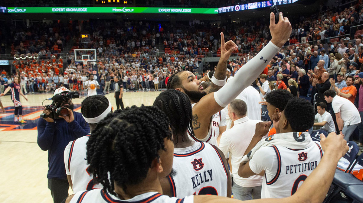 Auburn Tigers players celebrate after the game as Auburn Tigers take on Ole Miss Rebels at Neville Arena in Auburn, Ala., on Wednesday, Feb. 26, 2025.