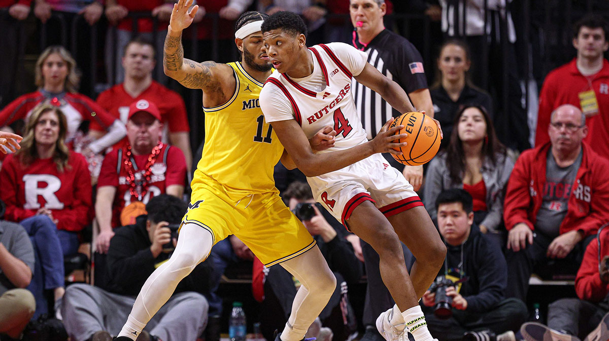 Rutgers Scarlet Knights guard Ace Bailey (4) is guarded by Michigan Wolverines guard Roddy Gayle Jr. (11) during the second half at Jersey Mike's Arena.
