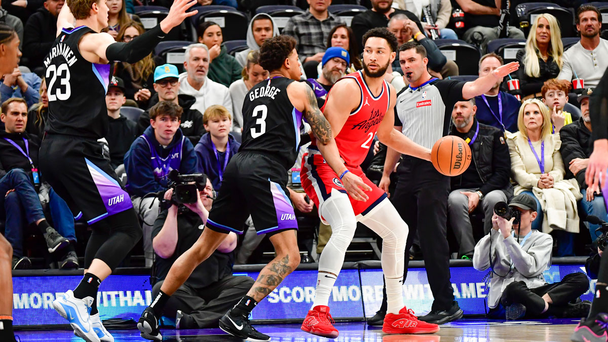 Utah Jazz guard Keyonte George (3) defends LA Clippers guard/forward Ben Simmons (25) during the first half at the Delta Center.