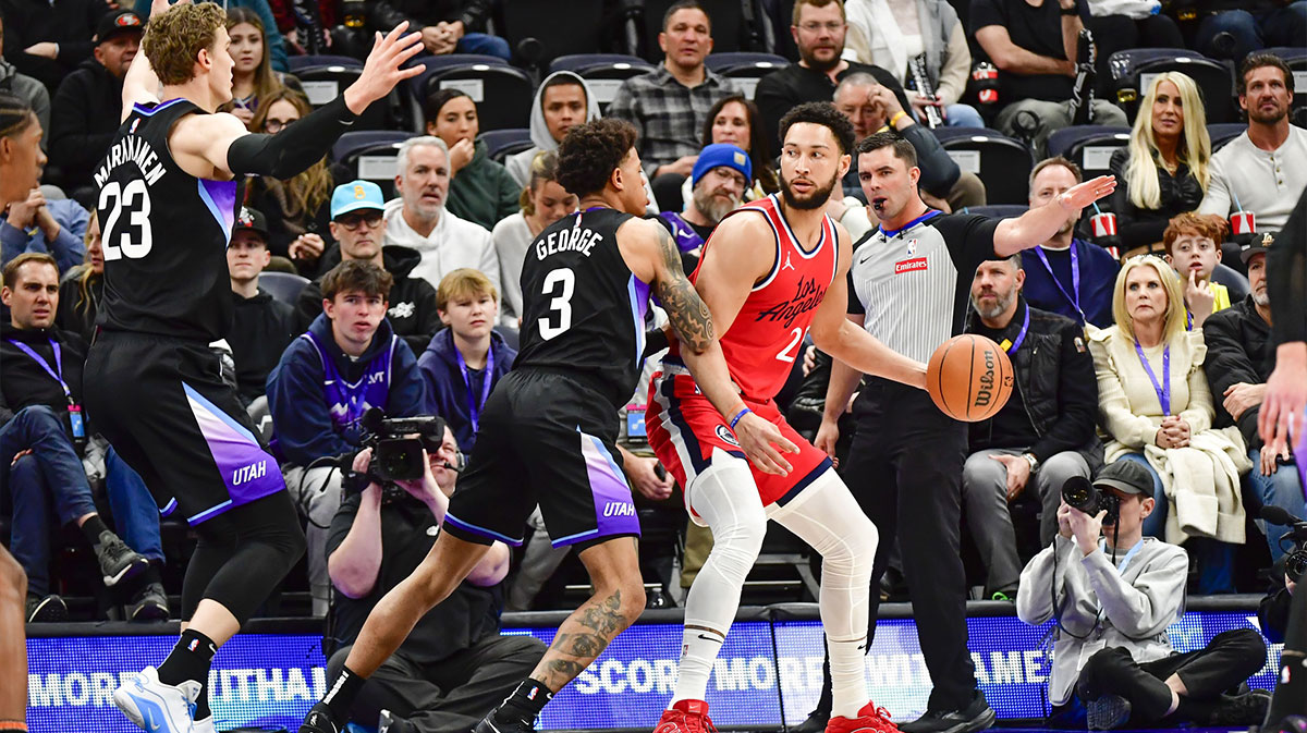 Utah Jazz guard Keyonte George (3) defends LA Clippers guard/forward Ben Simmons (25) during the first half at the Delta Center.