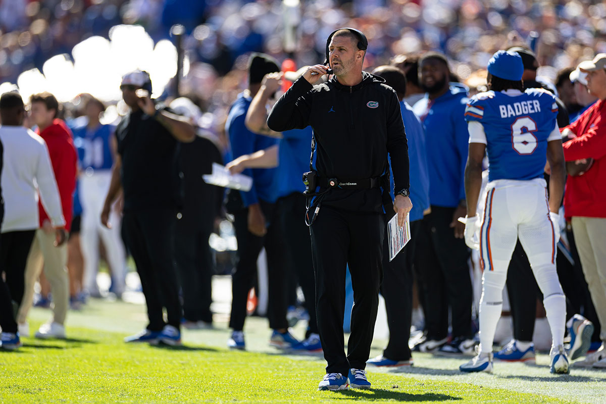 Florida Gators head coach Billy Napier looks on against the Mississippi Rebels during the first half at Ben Hill Griffin Stadium.