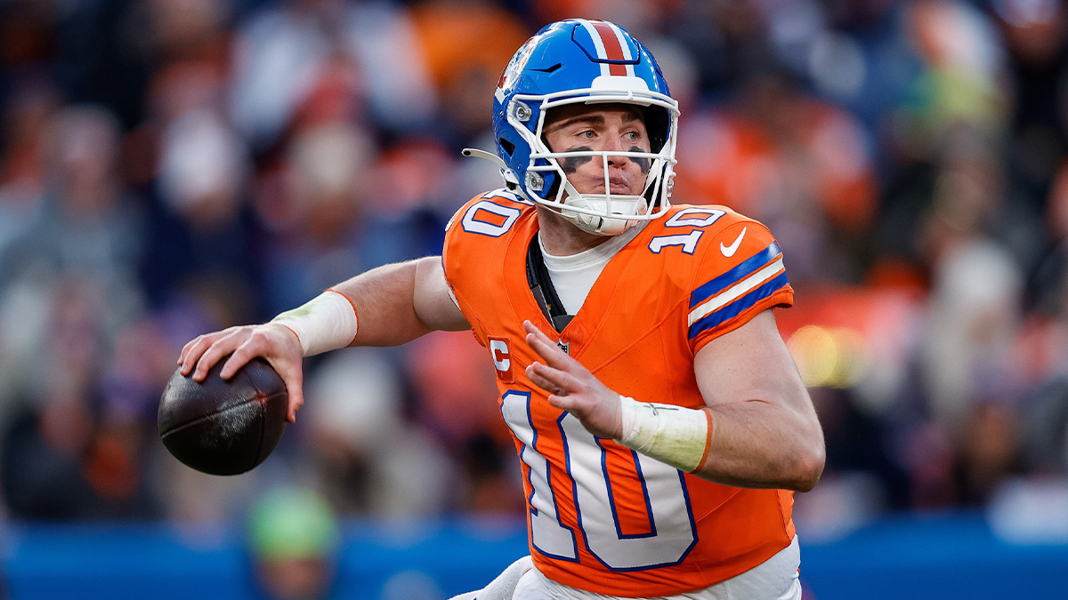 Denver Broncos quarterback Bo Nix (10) looks to pass in the third quarter against the Kansas City Chiefs at Empower Field at Mile High.